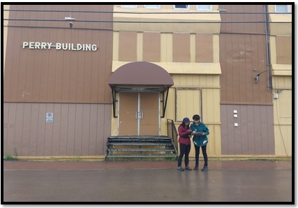 Kyla Hvatum (left) and Nicole Collison (right), another FSWEP student, marking a waypoint using a GPS receiver.