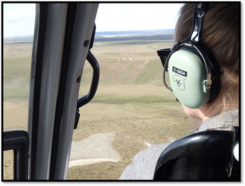  Katie travelling to Trail Valley Creek via helicopter. 