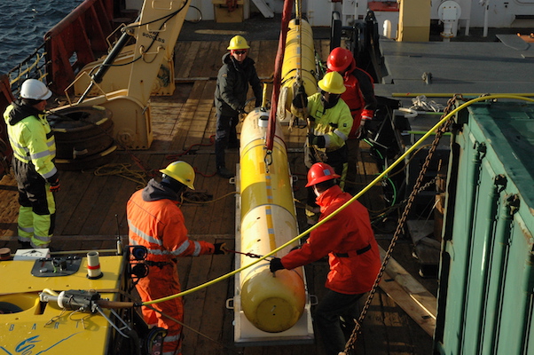 Once cradled, the AUV is quickly secured on deck.
